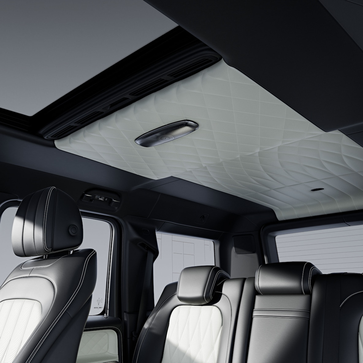 Vue latérale, à travers la porte passager ouverte, des sièges avant avec Pack Cuir intégral MANUFAKTUR.