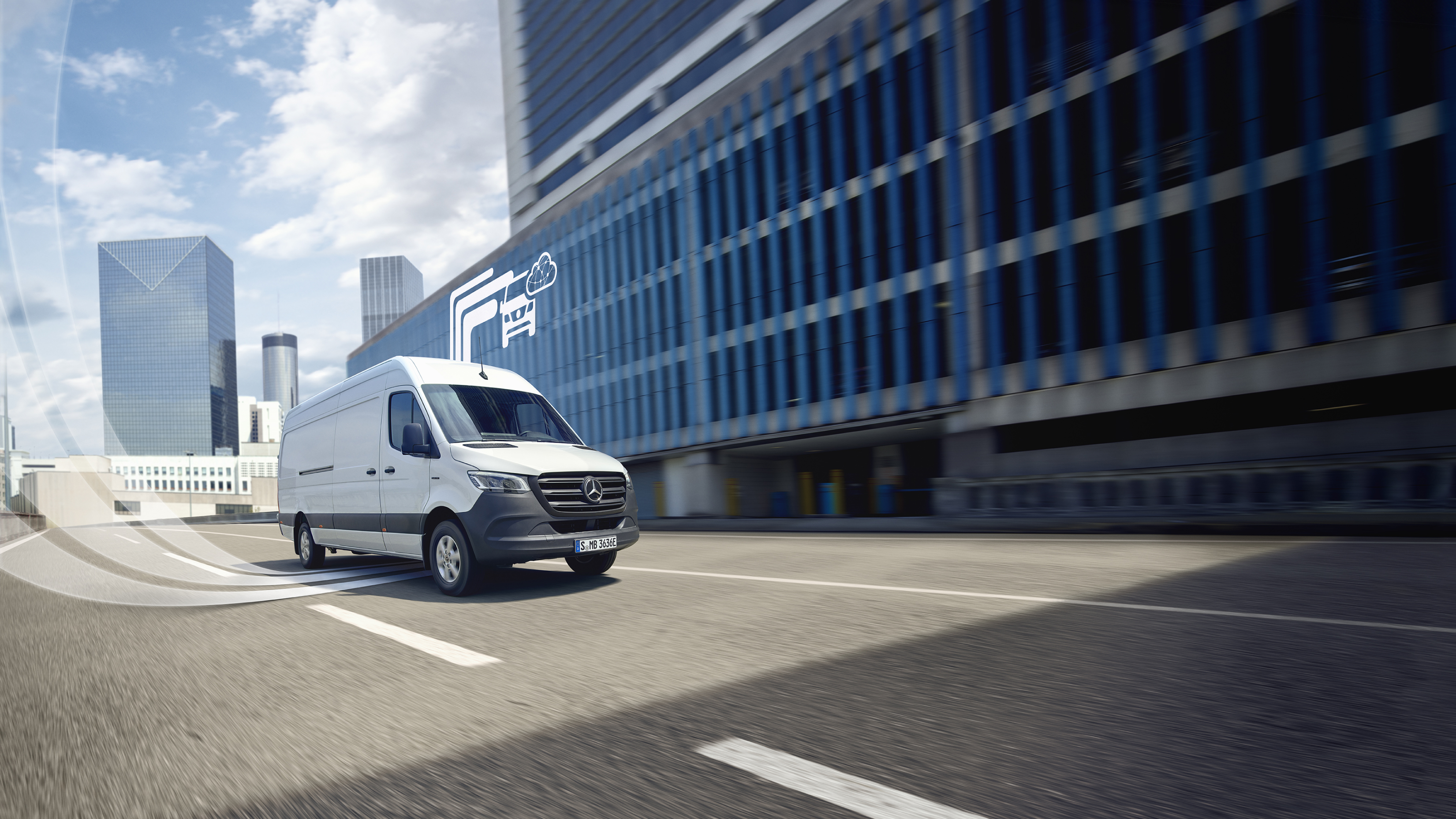 Digitale Extras | Mercedes-Benz Ein Transporter von Mercedes-Benz mit grafischen Elementen, welche die Digitalen Extras darstellen.