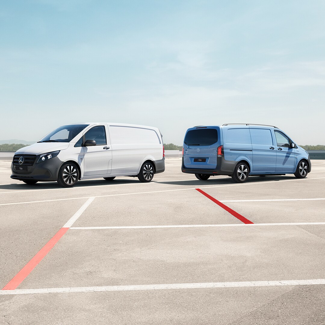 The Mercedes-Benz eCitan Panel Van is parked in front of a building. 